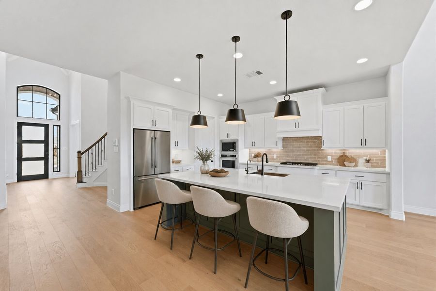 Furnished interior view inside a new home in Bridgeland 50′, Cypress (Image 5).