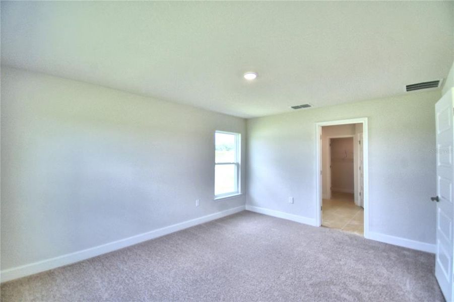 Spacious, unfurnished interior of a new home in Cadence Crossing, Auburndale (Image 19).