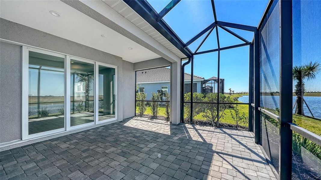 Exterior details and patio area of a home in Palm Grove, Lakewood Ranch (Image 24).