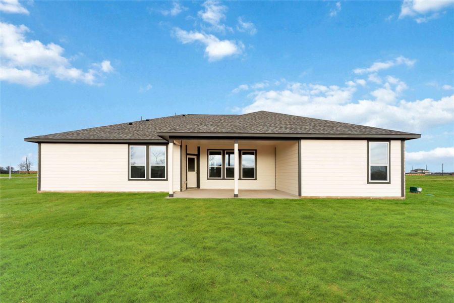 Exterior details and patio area of a home in Southfork Ranch, Sealy (Image 4).