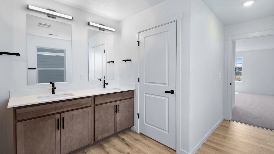 Furnished interior view inside a new home in Trails at Crowfoot, Parker (Image 14). Furnished interior view inside a new home in Trails at Crowfoot, Parker (Image 14).