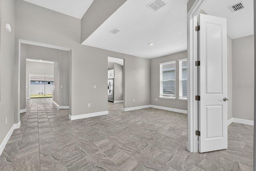 Spacious, unfurnished interior of a new home in Colbert Landings, Palm Coast (Image 26).