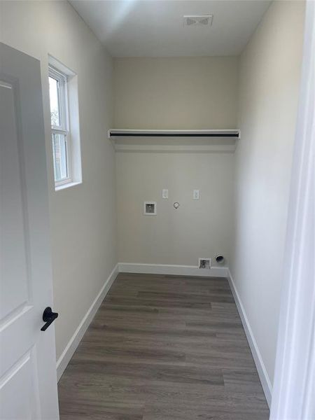 Spacious laundry room.