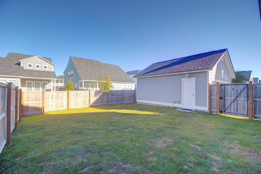 Exterior details and patio area of a home in Carnes Crossroads: Row Collection, Summerville (Image 20). Exterior details and patio area of a home in Carnes Crossroads: Row Collection, Summerville (Image 20).