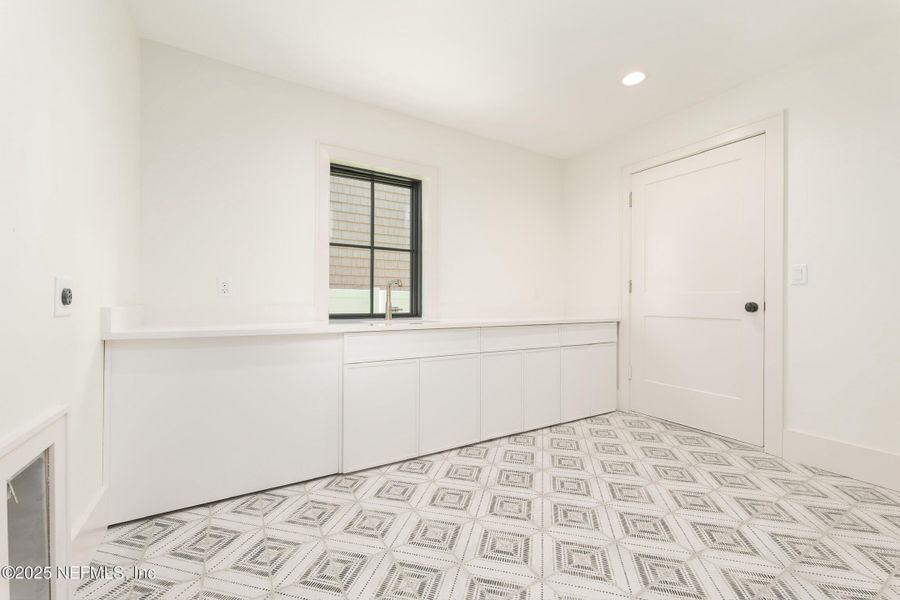 Furnished interior in a model home at Townhomes on 1st in Jacksonville Beach (Image 11).