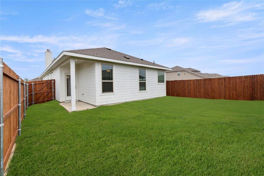 Front exterior of a new home in Creekside Ranch, Blue Ridge, TX, highlighting curb appeal (Image 19).