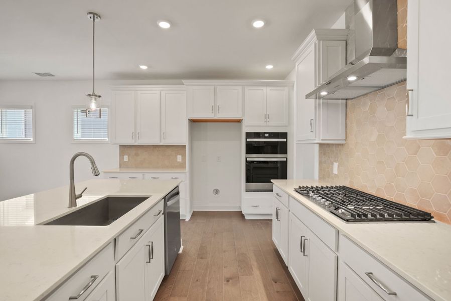 Spacious Kitchen with an Island Spacious Kitchen with an Island