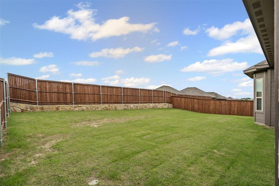 Exterior details and patio area of a home in , Godley (Image 3).
