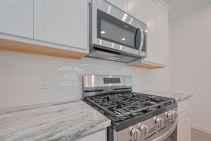 Close-up of interior finishes inside a home in Sunterra, Katy (Image 17).