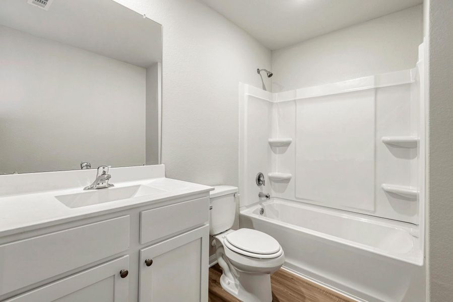 The secondary bathroom, located on the second floor of the home. The secondary bathroom, located on the second floor of the home.