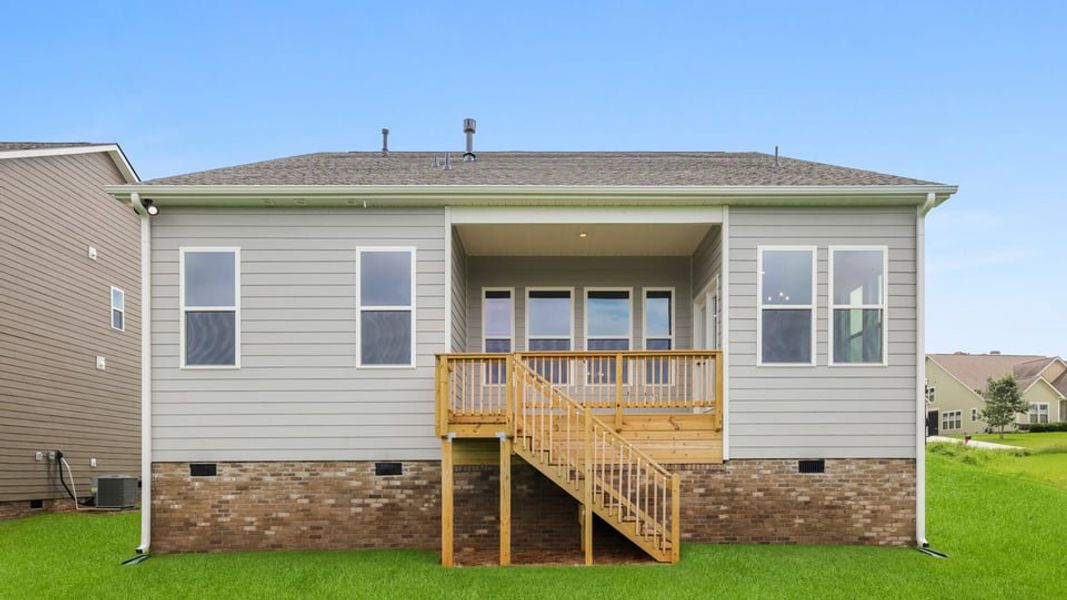 Exterior details and patio area of a home in Sunset Summits, Spartanburg (Image 22).