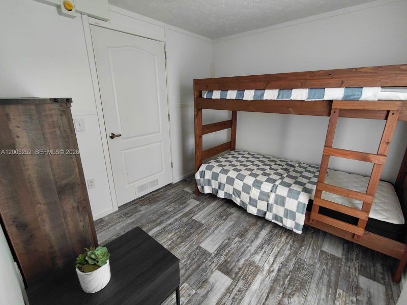 Furnished interior view inside a new home in , Clewiston (Image 7).