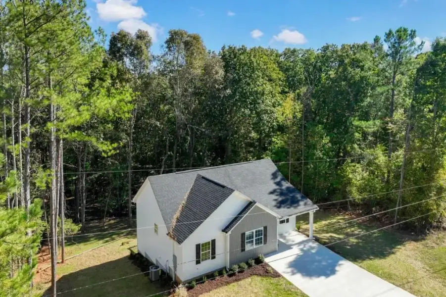Front exterior of a new home in , Lula, GA, highlighting curb appeal (Image 18).