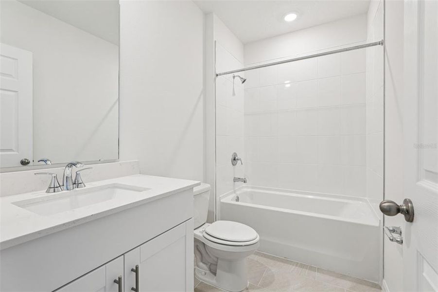 Furnished interior view inside a new home in Lake Deer Estates - Signature Series, Poinciana (Image 15).