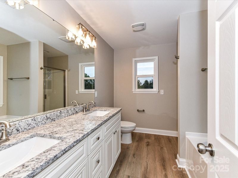 Furnished interior view inside a new home in , Oakboro (Image 13).