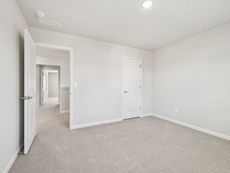 Spacious, unfurnished interior of a new home in Marshburn Landing - Signature Series, Wendell (Image 27).