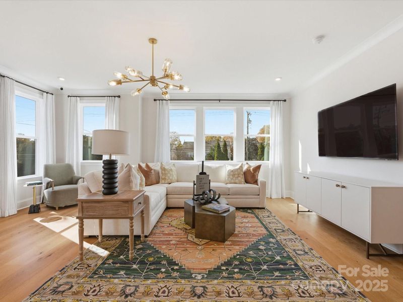 Great Room Surrounded by Bright Windows. *Model Photos | Actual Finishes, Structural Selections, and Orientation May Vary. Great Room Surrounded by Bright Windows. *Model Photos | Actual Finishes, Structural Selections, and Orientation May Vary.