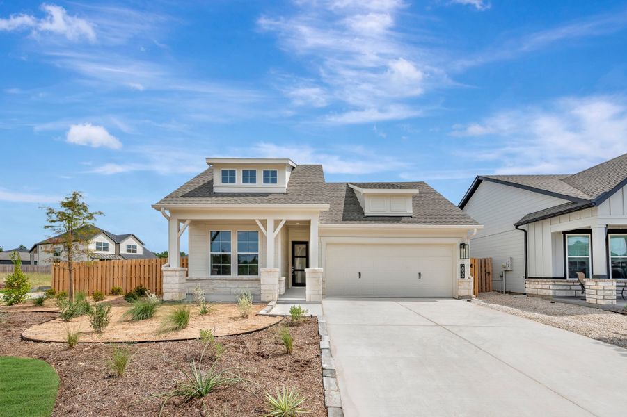 Front exterior of a new home in COLTON - Reserve Collection, Todd Mission, TX, highlighting curb appeal (Image 19). Front exterior of a new home in COLTON - Reserve Collection, Todd Mission, TX, highlighting curb appeal (Image 19).