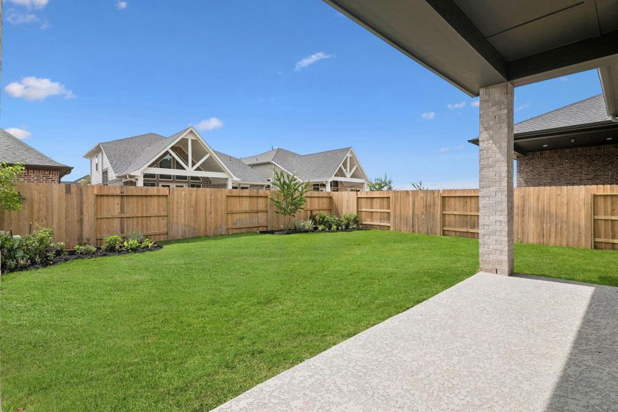 Front exterior of a new home in Grange 45' Homesites, Katy, TX, highlighting curb appeal (Image 22). Front exterior of a new home in Grange 45' Homesites, Katy, TX, highlighting curb appeal (Image 22).