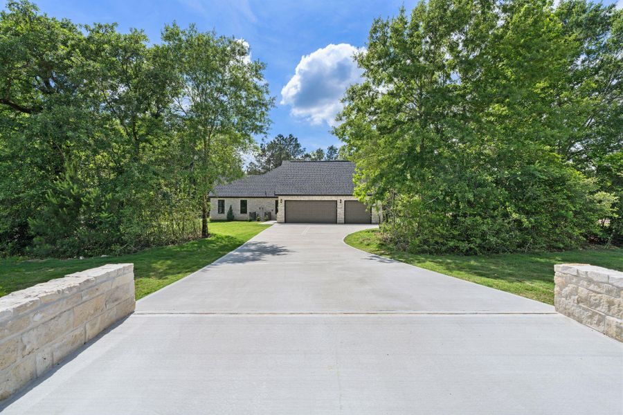 Front exterior of a new home in , Montgomery, TX, highlighting curb appeal (Image 25).