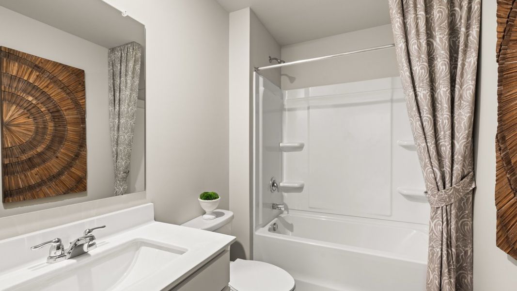 Representative furnished interior of a home built from the Elle by D.R. Horton in The Preserve at Agricultural Village, Perry (Image 39).