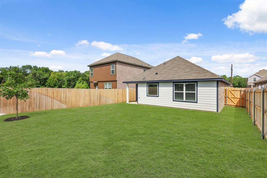 Front exterior of a new home in Christian Meadows, Ennis, TX, highlighting curb appeal (Image 1). Front exterior of a new home in Christian Meadows, Ennis, TX, highlighting curb appeal (Image 1).