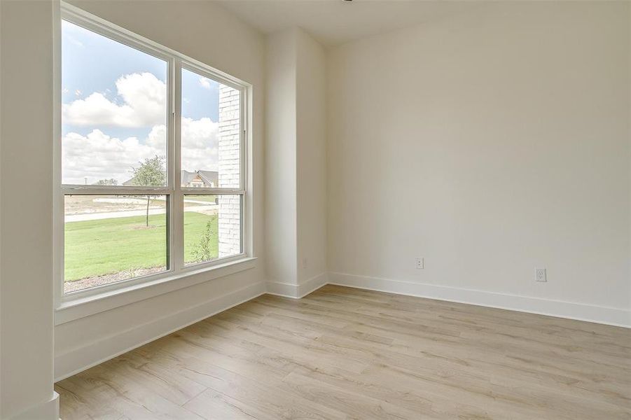 Unfurnished room featuring light hardwood / wood-style flooring