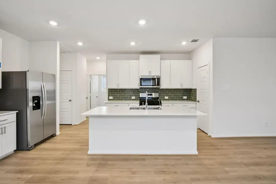 Photo is not of the actual home, but is an inspirational photo of builder’s model home and may depict options, furnishings, and/or decorator features that are not included