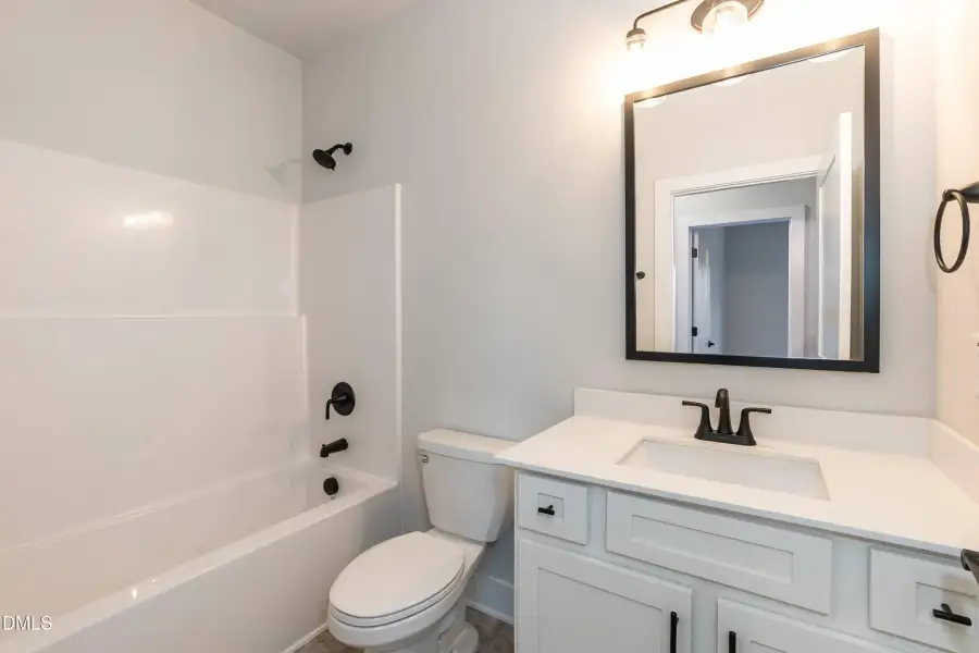 Furnished interior view inside a new home in Hidden Pines, Cameron (Image 7).