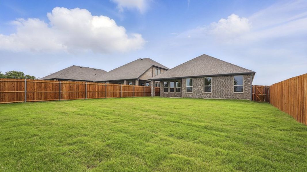 Representative exterior photo of a completed home built from the Durango by D.R. Horton in Madera, Royse City, TX (Image 24). Representative exterior photo of a completed home built from the Durango by D.R. Horton in Madera, Royse City, TX (Image 24).