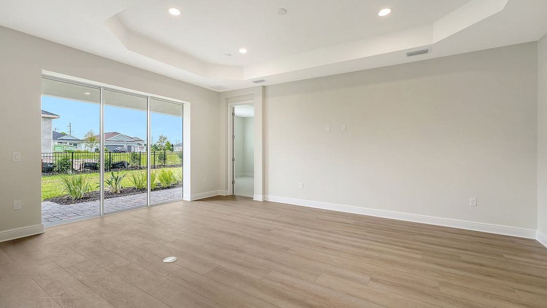 Spacious, unfurnished interior of a new home in Wildleaf Real Estate and Homes for Sale in Parrish, FL - Neal Communities, Parrish (Image 14).