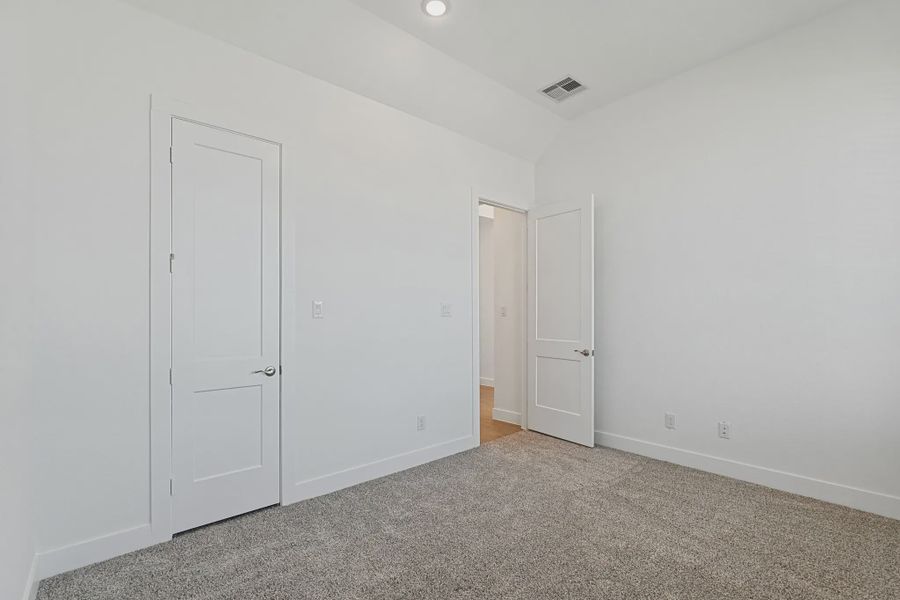 Representative unfurnished interior of a home built from the Brentwood by Chesmar Homes in Meridiana 50's and 60's, Manvel (Image 12).