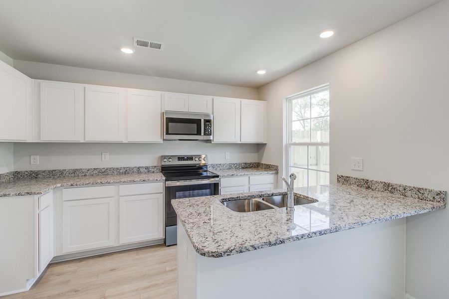 Furnished interior view inside a new home in Padgett Commons, Hopkins (Image 7).