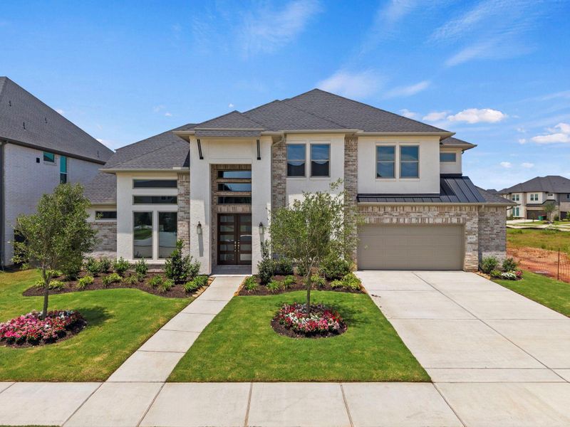 Front exterior of a new home in Harvest Green, Richmond, TX, highlighting curb appeal (Image 20). Front exterior of a new home in Harvest Green, Richmond, TX, highlighting curb appeal (Image 20).