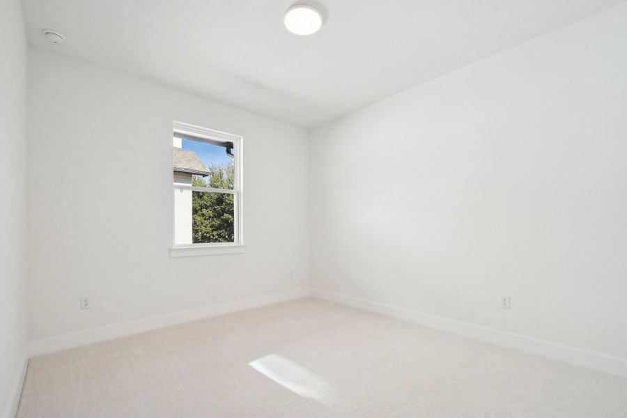 Spacious, unfurnished interior of a new home in Koenig Townhomes, Austin (Image 29).