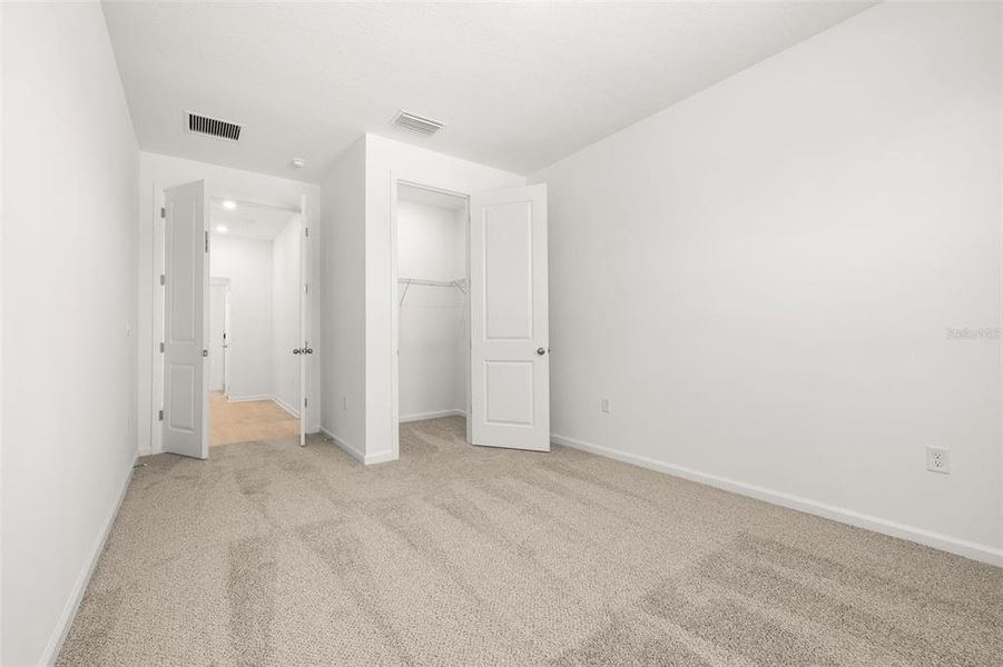 Spacious, unfurnished interior of a new home in Serenade at Ovation, Winter Garden (Image 23). Spacious, unfurnished interior of a new home in Serenade at Ovation, Winter Garden (Image 23).