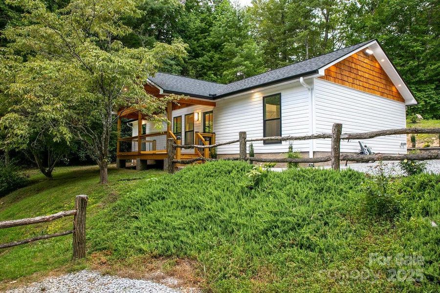 Front exterior of a new home in , Brevard, NC, highlighting curb appeal (Image 21).
