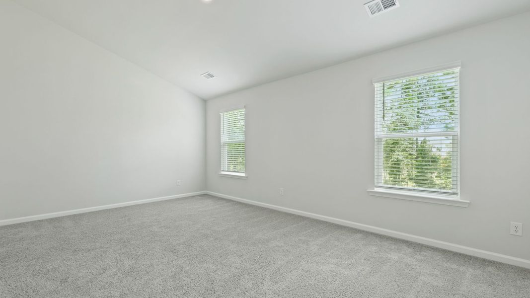 Spacious, unfurnished interior of a new home in Pine Hills Townhomes at Cane Bay, Summerville (Image 17).
