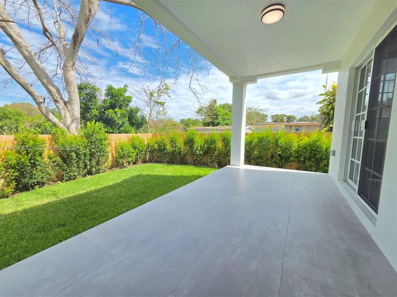 Exterior details and patio area of a home in , West Palm Beach (Image 3).