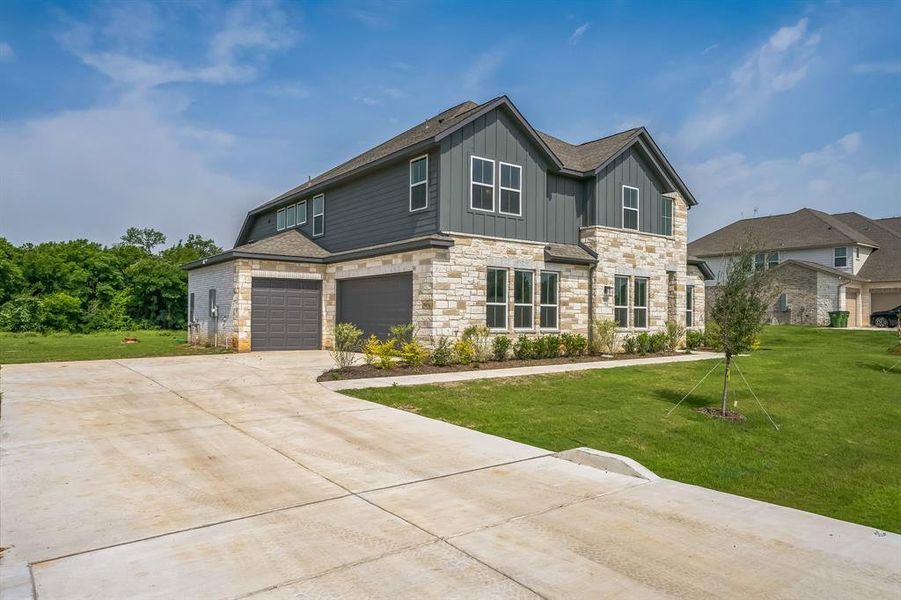 Front exterior of a new home in Eagle Estates, Cross Timber, TX, highlighting curb appeal (Image 19).