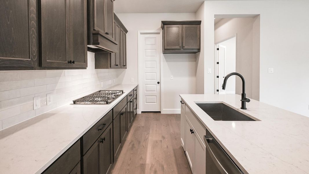 Furnished interior view inside a new home in 6 Creeks, Kyle (Image 10).