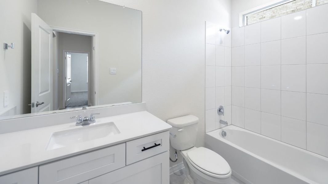Representative furnished interior of a home built from the Burrow by D.R. Horton in The Landing at Hidden Lakes, McKinney (Image 13).