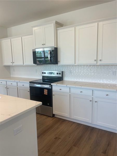 Furnished interior view inside a new home in Springwood Grove, Central (Image 5).