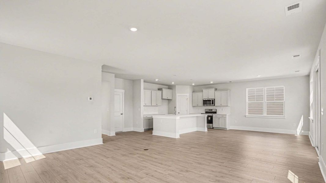 Representative unfurnished interior of a home built from the Mackenzie2 by D.R. Horton in Chapman Village, Conway (Image 8).