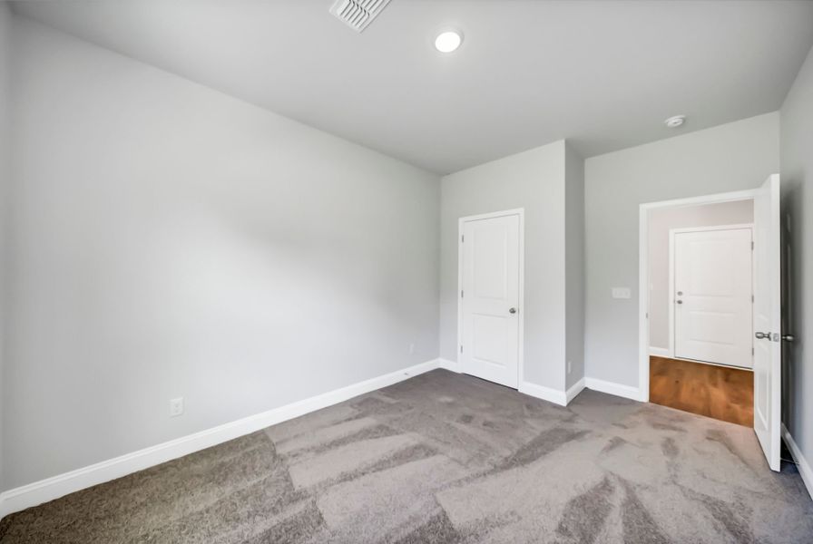 Spacious, unfurnished interior of a new home in Monroe Preserve, Chapin (Image 37).