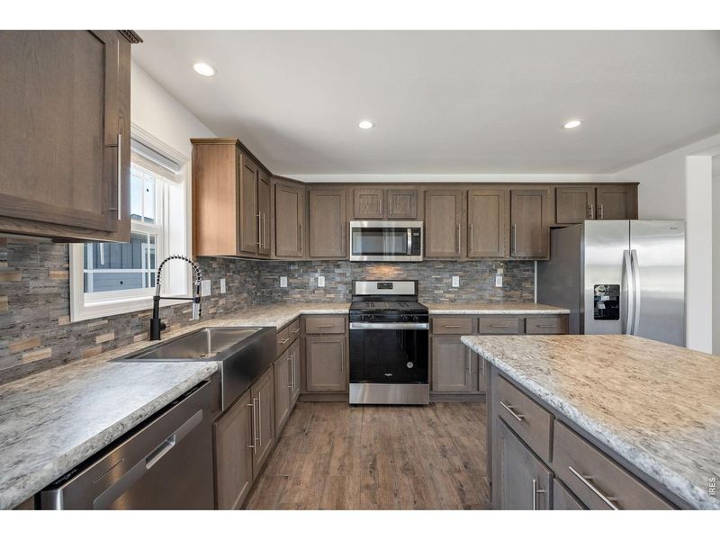 Furnished interior view inside a new home in , Loveland (Image 5). Furnished interior view inside a new home in , Loveland (Image 5).