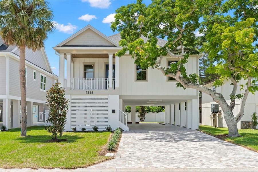 Front exterior of a new home in , St. Petersburg, FL, highlighting curb appeal (Image 23).