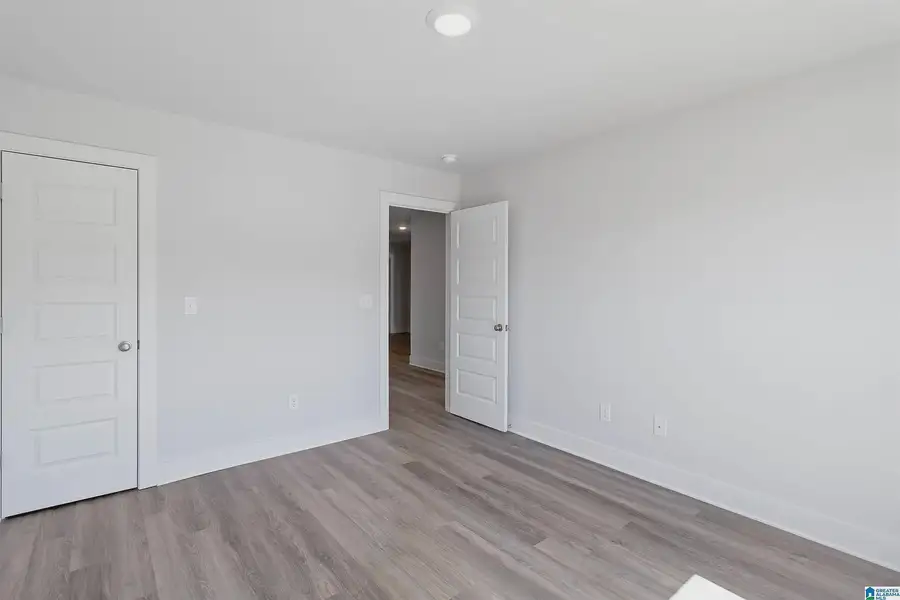 Representative unfurnished interior of a home built from the 3000 by Adams Homes in Hill Country Estates, Dade City (Image 23).