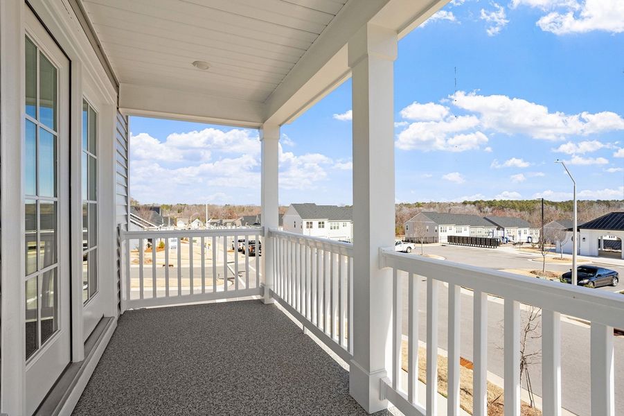 Exterior details and patio area of a home in Renaissance at White Oak, Garner (Image 3).