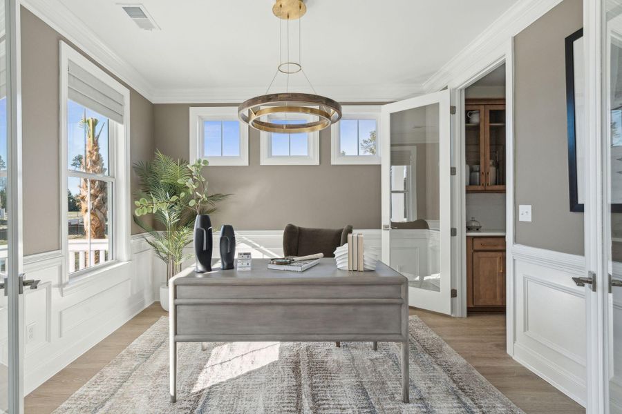 Furnished interior view inside a new home in Tidewater at Lakes of Cane Bay, Summerville (Image 12).
